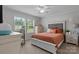 Cozy bedroom with natural light, neutral walls and a ceiling fan, and complementary decor at 2843 Hopewell Church Rd, Sherrills Ford, NC 28673