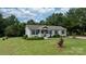 Lovely home with a pristine lawn, complemented by flourishing landscaping at 2843 Hopewell Church Rd, Sherrills Ford, NC 28673
