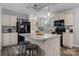 Stylish kitchen with a large center island, pendant lighting, modern appliances, and ample counter space at 2843 Hopewell Church Rd, Sherrills Ford, NC 28673