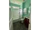 Bathroom featuring a shower-tub combo, toilet, sink, and vanity at 28835 Hartsell Rd, Albemarle, NC 28001