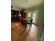 Dining area with a wooden table and access to the back deck at 28835 Hartsell Rd, Albemarle, NC 28001