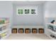 Bedroom featuring a window bench with storage, built in shelving on each side and a light-filled window at 2941 Forest Park Dr, Charlotte, NC 28209
