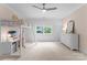 Bedroom featuring a lofted bed, desk, and a large window with natural light at 2941 Forest Park Dr, Charlotte, NC 28209