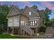Stunning two-story home with a screened porch and a brick foundation, exuding charm and elegance at 2941 Forest Park Dr, Charlotte, NC 28209