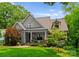 Inviting home with a well-manicured lawn, stone accents, and a welcoming front porch at 2941 Forest Park Dr, Charlotte, NC 28209