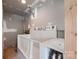 Dedicated dog wash station with white tile, providing a convenient and tidy grooming space at 326 Teeter Rd, Mooresville, NC 28115