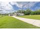Beautiful home with a well-manicured lawn, long driveway, and a detached garage at 326 Teeter Rd, Mooresville, NC 28115