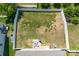 Aerial view of a fenced backyard with a well-maintained lawn, a patio area, and an outdoor dining set at 4117 Sunset Ridge Dr, Rock Hill, SC 29732