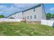Fenced backyard with lawn, patio, and room for outdoor activities at 4117 Sunset Ridge Dr, Rock Hill, SC 29732