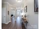 Inviting hallway with beautiful flooring and neutral paint, leading to the living areas at 4117 Sunset Ridge Dr, Rock Hill, SC 29732