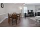 Open-concept living and dining area with hardwood floors and plenty of space for entertaining at 4117 Sunset Ridge Dr, Rock Hill, SC 29732