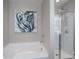 Spa-like bathroom with tub and glass shower featuring modern tile and bright lighting, perfect for relaxation at 4117 Sunset Ridge Dr, Rock Hill, SC 29732