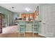 Kitchen featuring bar seating and stainless steel appliances at 4502 Magnolia Ridge Dr, Waxhaw, NC 28173