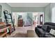 Inviting living space with tile floors leading to a staircase and dining area at 4502 Magnolia Ridge Dr, Waxhaw, NC 28173