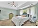 The main bedroom features a tray ceiling, ceiling fan and neutral walls at 4502 Magnolia Ridge Dr, Waxhaw, NC 28173