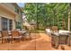 Relaxing outdoor patio area featuring a dining table and comfortable seating for entertaining guests at 4502 Magnolia Ridge Dr, Waxhaw, NC 28173