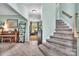 Open floor plan showcasing a staircase leading to a comfortable living area at 4502 Magnolia Ridge Dr, Waxhaw, NC 28173