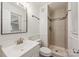 Renovated bathroom featuring tiled shower and updated vanity at 4533 Gainesborough Rd, Charlotte, NC 28205