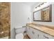 Bathroom featuring tiled shower and sink with modern vanity at 4533 Gainesborough Rd, Charlotte, NC 28205