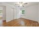 Bedroom boasting hardwood floors, closet and natural lighting at 4533 Gainesborough Rd, Charlotte, NC 28205