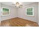 Bright bedroom with hardwood floors, ceiling fan and natural light at 4533 Gainesborough Rd, Charlotte, NC 28205