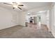 Open-concept living area connected to the kitchen with plush carpeting at 4533 Gainesborough Rd, Charlotte, NC 28205