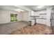 Cozy living area next to the kitchen with open access to the outside at 4533 Gainesborough Rd, Charlotte, NC 28205