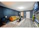 Stylish living room boasts hardwood floors, modern lighting, and contemporary decor with lots of open space at 4916 Oak Pasture Ln, Charlotte, NC 28269