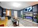 Stylish living room boasts hardwood floors, modern lighting, and contemporary decor with lots of open space at 4916 Oak Pasture Ln, Charlotte, NC 28269
