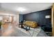Stylish living room boasts hardwood floors, modern lighting, and contemporary decor with lots of open space at 4916 Oak Pasture Ln, Charlotte, NC 28269