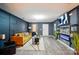 Stylish living room boasts hardwood floors, modern lighting, and contemporary decor with lots of open space at 4916 Oak Pasture Ln, Charlotte, NC 28269