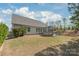 Expansive backyard featuring a brick patio and screened-in porch, great for enjoying the outdoors at 5002 Samoa Ridge Dr, Lancaster, SC 29270
