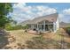 Spacious backyard with a brick patio, perfect for outdoor relaxation and entertaining in a private setting at 5002 Samoa Ridge Dr, Lancaster, SC 29270