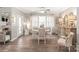 Cozy dining area with a round table, shuttered windows, and decorative accents at 5002 Samoa Ridge Dr, Lancaster, SC 29270