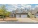 Well-maintained home boasting a brick facade, two-car garage, dormer windows, and manicured lawn at 5002 Samoa Ridge Dr, Lancaster, SC 29270