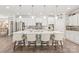 Modern kitchen featuring a large island with counter seating, pendant lighting, and white cabinetry at 5002 Samoa Ridge Dr, Lancaster, SC 29270