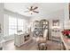 Well-lit home office with a large window, stylish desk, and ample storage for an inviting workspace at 5002 Samoa Ridge Dr, Lancaster, SC 29270