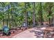 Picturesque community trail by the lake with benches for relaxation, offering a peaceful natural escape at 5002 Samoa Ridge Dr, Lancaster, SC 29270