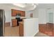 Well-equipped kitchen with wooden cabinetry, black appliances, and an open design for easy access at 5306 Prosperity View Dr, Charlotte, NC 28269