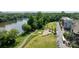 Scenic aerial view of park featuring a riverside amphitheater, walking path, green space and waterfront views at 536 Spring Landing Dr, Rock Hill, SC 29730