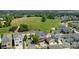 An aerial view showcases the neighborhood, including a purple home nestled among other colorful residences at 536 Spring Landing Dr, Rock Hill, SC 29730