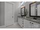 Bathroom featuring double sinks with granite countertops and modern fixtures at 536 Spring Landing Dr, Rock Hill, SC 29730