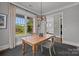 Bright dining room with hardwood floors, modern lighting and natural light at 536 Spring Landing Dr, Rock Hill, SC 29730