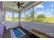 Enclosed porch featuring large windows with bright blue yoga mat and natural light at 536 Spring Landing Dr, Rock Hill, SC 29730