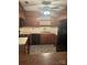 A well-appointed kitchen with tile flooring, wood cabinets, and modern appliances at 550 Camrose Ne Cir, Concord, NC 28025