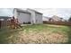 Large backyard with play set, patio, and privacy fence at 585 Gentle Breeze Ln, Rock Hill, SC 29730