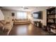 Spacious living room with laminate floors, a ceiling fan, and neutral decor at 585 Gentle Breeze Ln, Rock Hill, SC 29730