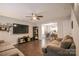 Living room with laminate floors, open layout, and neutral decor at 585 Gentle Breeze Ln, Rock Hill, SC 29730