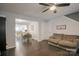 Cozy living room featuring an open floor plan, laminate floors, and neutral paint at 585 Gentle Breeze Ln, Rock Hill, SC 29730
