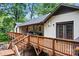 Backyard featuring a large deck with outdoor furniture at 625 S Magnolia St, Mooresville, NC 28115